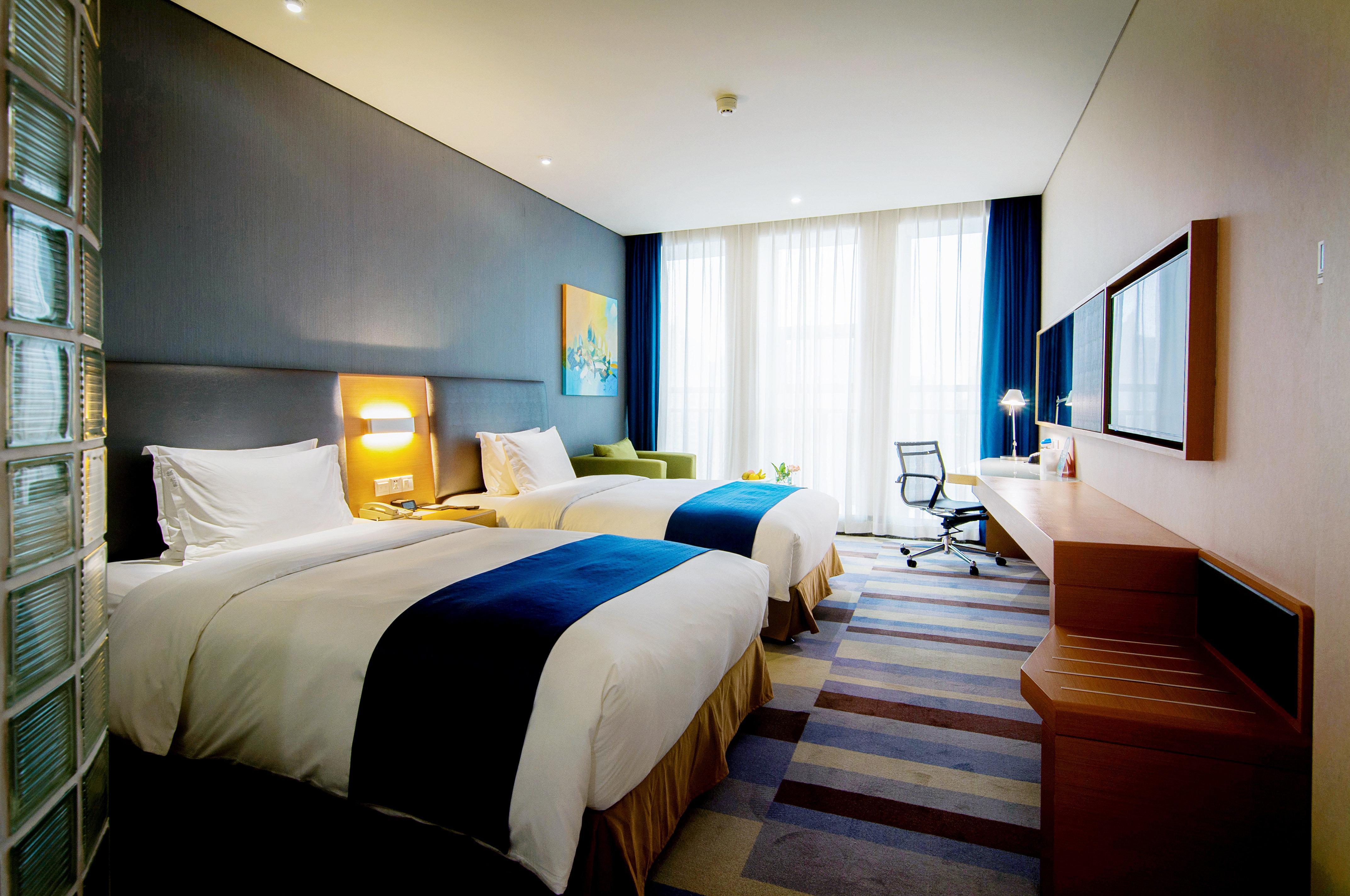 Holiday Inn Express Leshan City Square By Ihg High Speed Rail And Leshan Giant Buddha Exterior foto